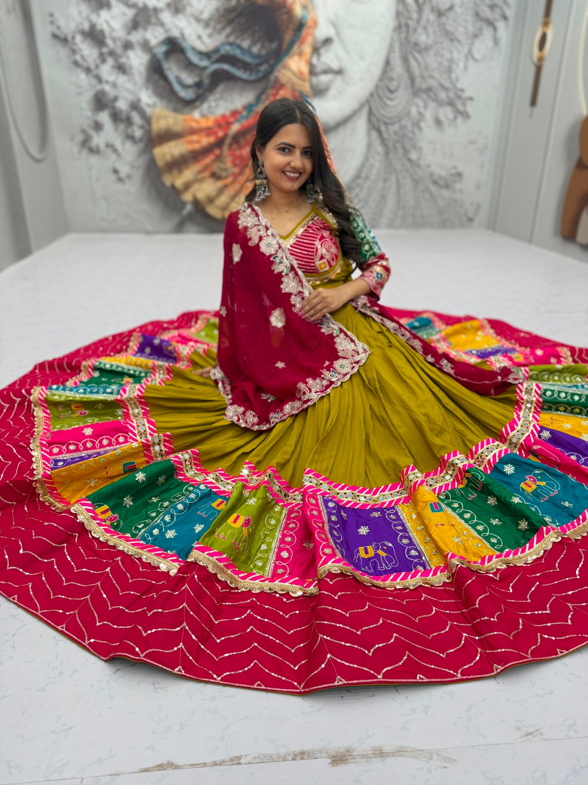 Women's Mustard Navratri Lehenga Choli with Multicolor Border & Embroidered Cape Dupatta