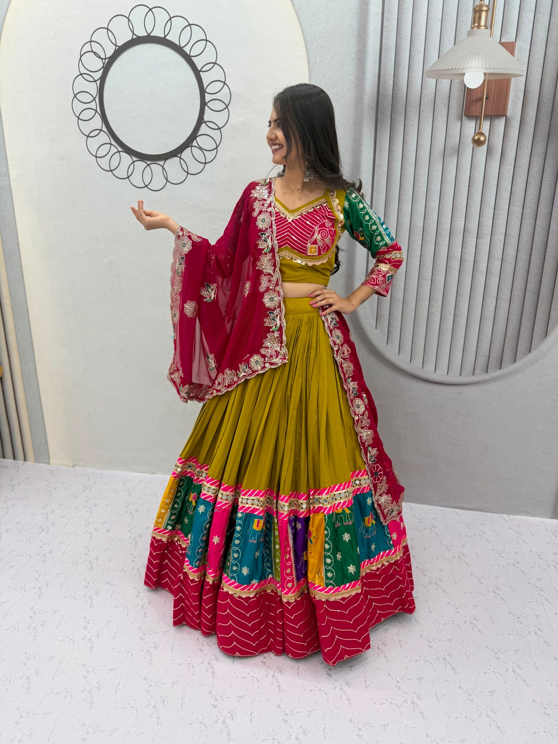 Women's Mustard Navratri Lehenga Choli with Multicolor Border & Embroidered Cape Dupatta