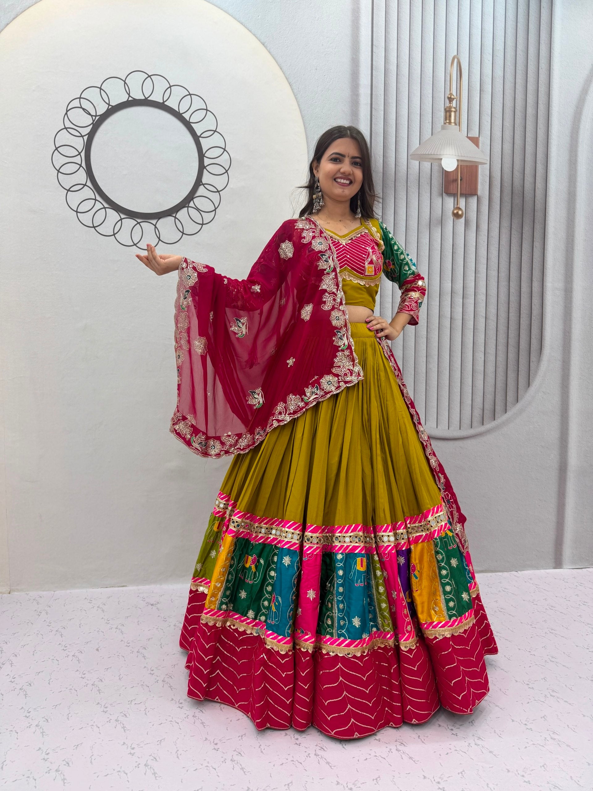 Women's Mustard Navratri Lehenga Choli with Multicolor Border & Embroidered Cape Dupatta
