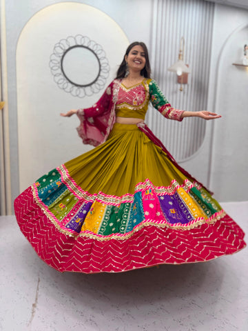 Women's Mustard Navratri Lehenga Choli with Multicolor Border & Embroidered Cape Dupatta